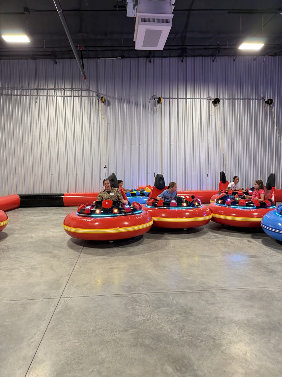 Guests riding bumper cars at Alleyway Entertainment